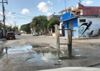 Con lluvias, se duplican baches en Cancún