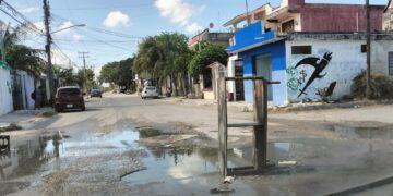 Con lluvias, se duplican baches en Cancún